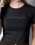 i-want-the-fairytale-black-t-shirt-mockup-of-a-fashionable-girl-holding-a-leaf-against-her-face