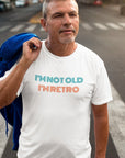 im-not-old-im-retro-white-t-shirt-mockup-featuring-a-man-standing-in-a-crosswalk