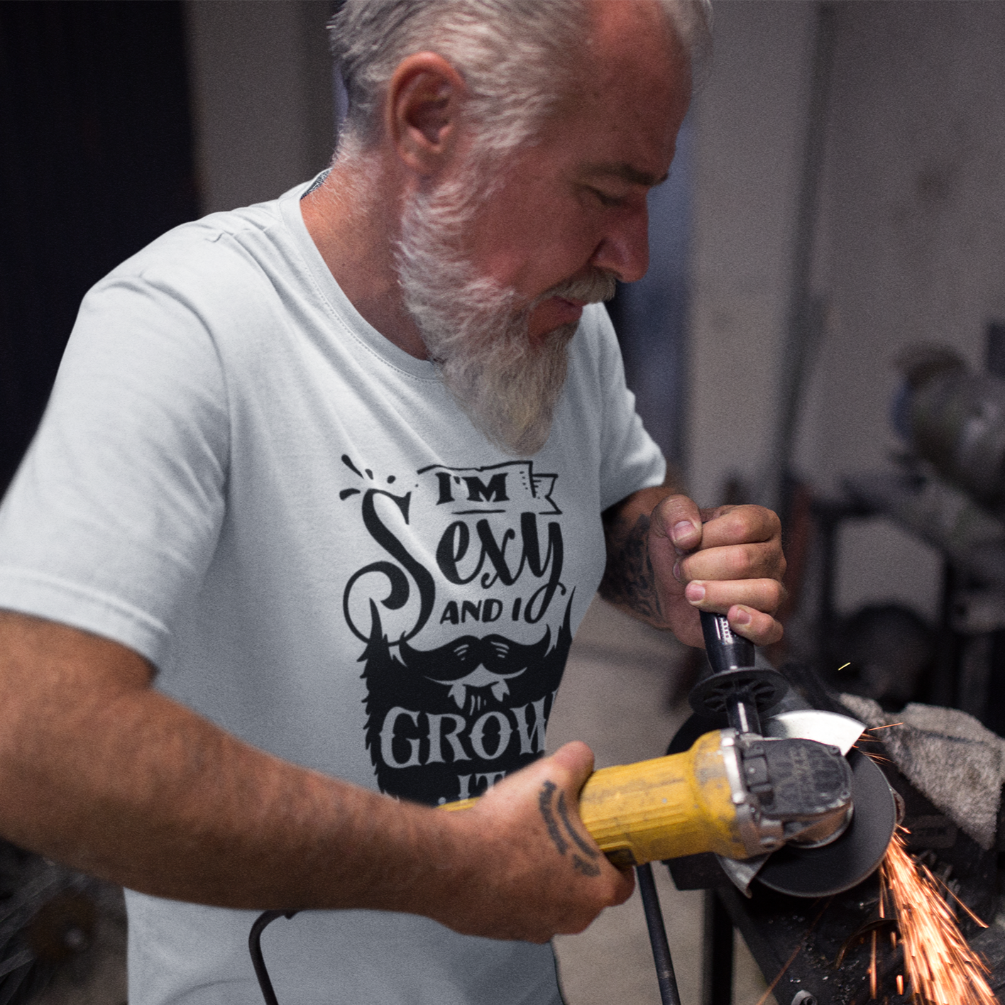 im-sexy-and-i-grow-it-white-t-shirt-round-neck-tee-mockup-of-an-older-bearded-man-hard-at-work