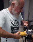 im-sexy-and-i-grow-it-white-t-shirt-round-neck-tee-mockup-of-an-older-bearded-man-hard-at-work
