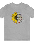 in-a-world-full-of-roses-be-a-sunflower-ahtletic-heather-t-shirt-womens