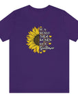 in-a-world-full-of-roses-be-a-sunflower-team-purple-t-shirt-womens