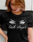 lash-slayer-black-t-shirt-womens-fashion-mockup-of-a-blonde-woman-checking-out-her-tee