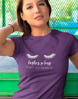 lashes-so-long-i-cant-see-my-haters-team-purple-t-shirt-womens-mockup-of-a-young-woman-fixing-her-hair