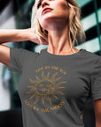 live-by-the-sun-love-by-the-moon-asphalt-t-shirt-with-sun-and-moon-design-mockup-featuring-a-woman-posing-on-a-city-street
