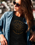 live-by-the-sun-love-by-the-moon-black-t-shirt-with-sun-and-moon-design-mockup-of-a-woman-with-long-hair-wearing-a-crewneck-tee-outside