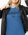 manifest-that-shit-true-royal-blue-t-shirt-womens-tee-bella-canvas-mockup-of-a-woman-in-a-studio-wearing-a-leather-jacket