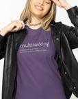 multitasking-screwing-up-several-things-at-once-team-purple-t-shirt-bella-canvas-tee-mockup-of-a-woman-in-a-studio-wearing-a-leather-jacket