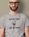not-my-coop-not-my-poop-athletic-heather-grey-t-shirt-chicken-funny-animal-tee-mockup-of-a-bearded-man-with-arm-tattoos