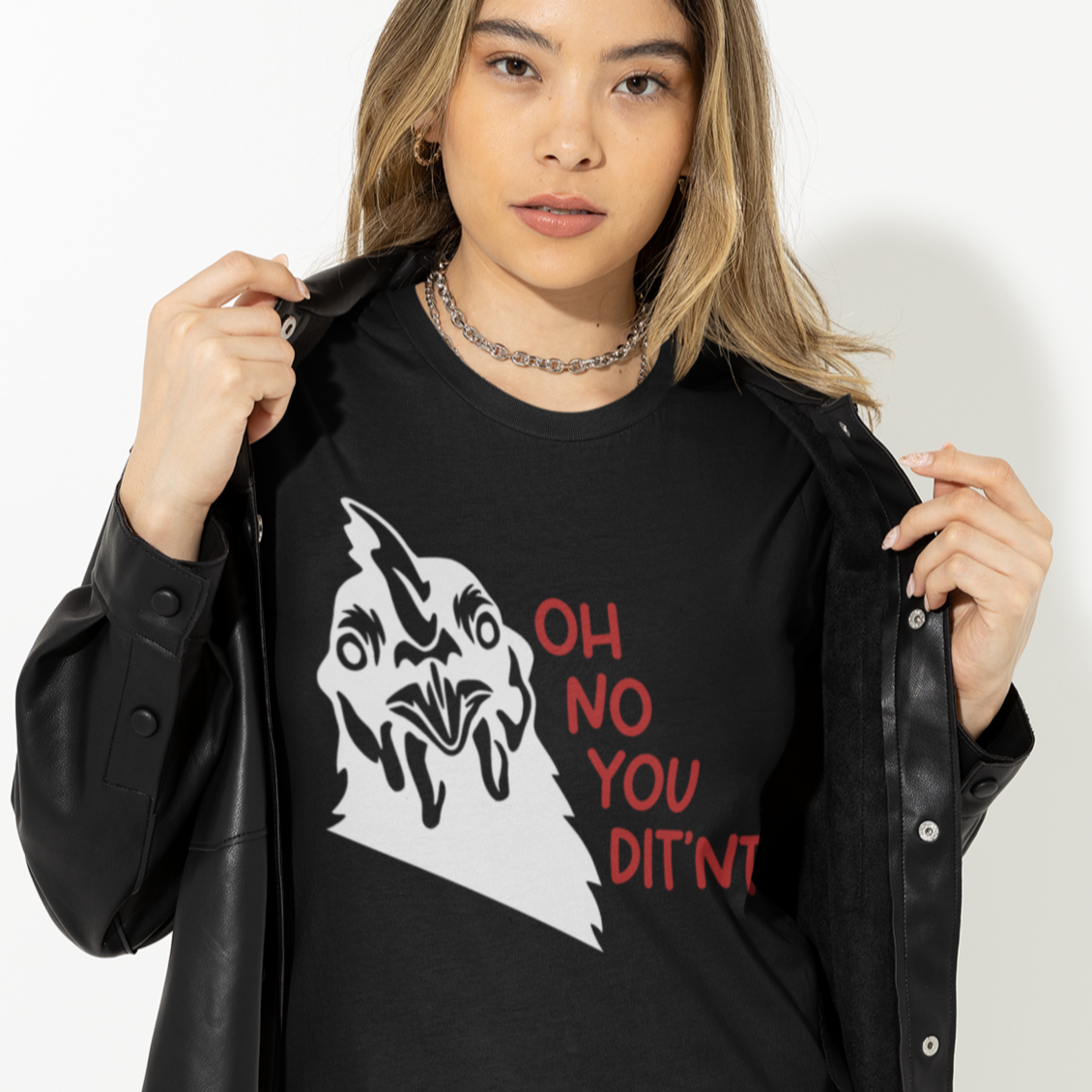 oh-no-you-ditnt-didnt-white-t-shirt-mockup-of-a-woman-posing-with-a-serious-look-and-a-leather-jacket