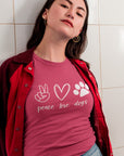 peace-love-dogs-berry-t-shirt-mockup-of-a-woman-wearing-a-tee-and-red-jacket