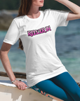 reeler-in-white-t-shirt-mockup-of-a-woman-at-the-beach-on-a-sunny-day-fishing