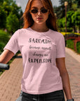 sarcasm-because-assault-charges-are-expensive-pink-t-shirt-women-funny-sarcastic-mockup-of-a-woman-using-a-scooter