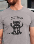stay-trashy-with-racoon-athletic-heather-t-shirt-unisex-mockup-featuring-a-man-with-tattoos-on-one-arm