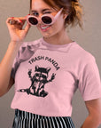 trash-panda-racoon-pink-t-shirt-unisex-tee-mockup-of-a-girl-with-cool-sunglasses-winking