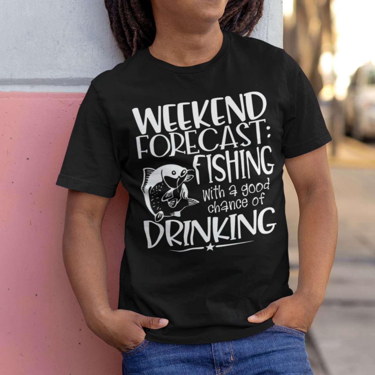 weekend-forecast-fishing-with-a-good-chance-of-drinking-black-t-shirtbella-canvas-t-shirt-mockup-of-a-happy-man-leaning-against-a-wall