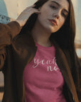 yeah-no-berry-t-shirt-womens-mockup-of-a-girl-wearing-a-t-shirt-and-a-vintage-bomber-jacket-posing-against-a-truck