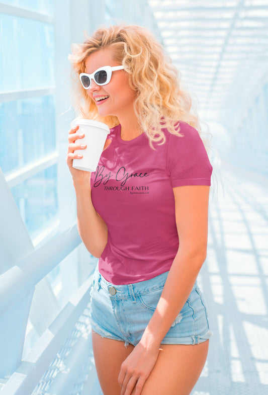 by-grace-through-faith-ephesians-2-8-berry-t-shirt-womens-faith-inspiring-mockup-featuring-a-blonde-woman-with-sunglasses