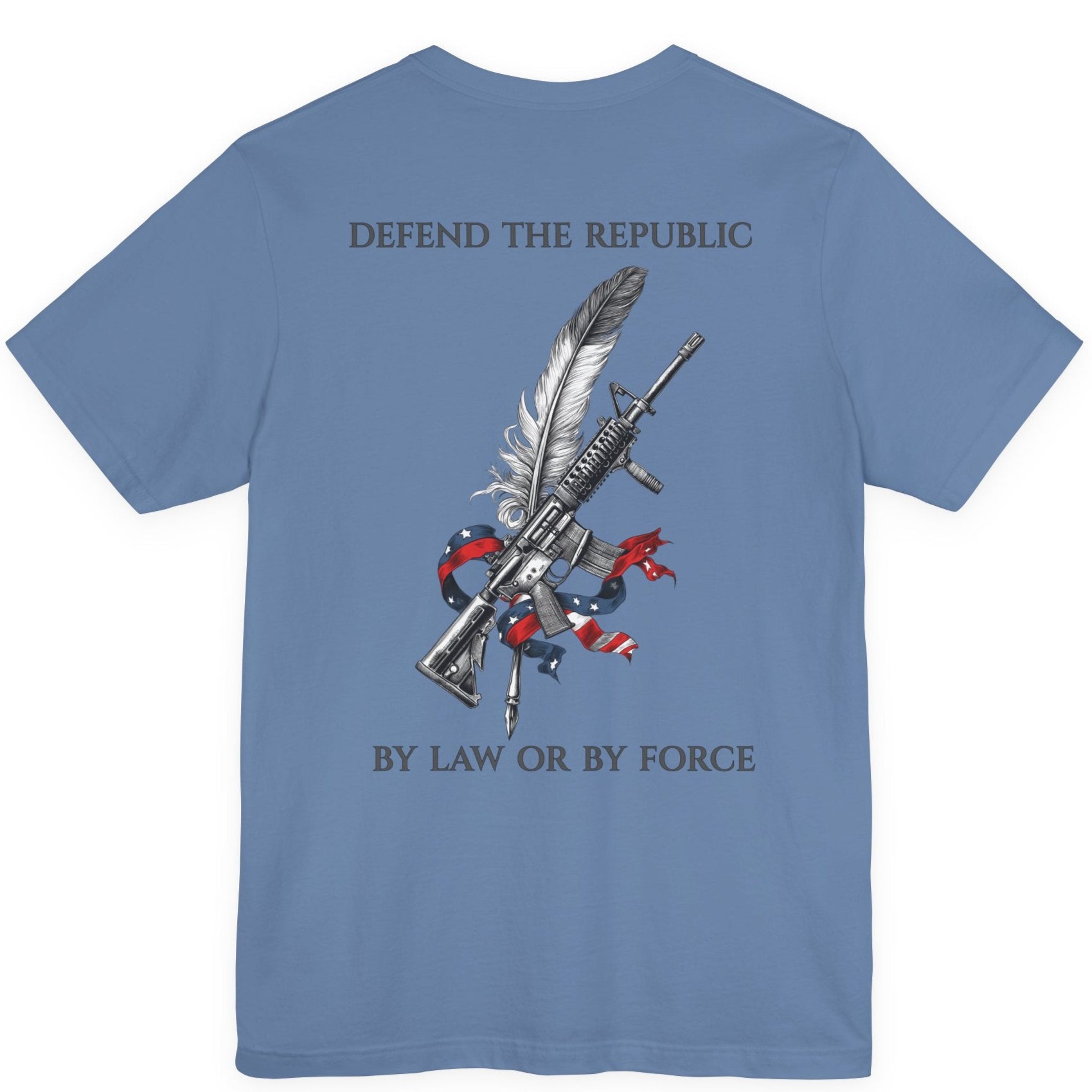 Back view of a lavender blue colored t-shirt with a graphic design of a rifle crossed with a quill fountain pen and an American flag ribbon, with the quote Defend the Republic by law or by force. Patriotic Shirts. logo design on front.