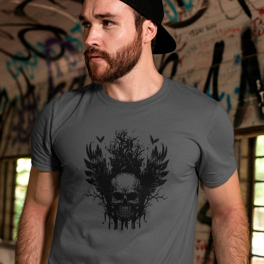 dark-skull-with-wings-graphic-asphalt-t-shirt-mockup-featuring-a-bearded-man-with-a-cap-by-a-graffiti-wall