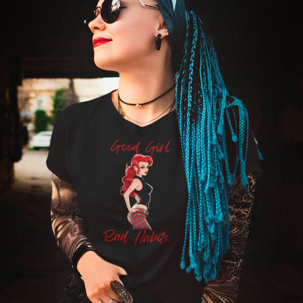 good-girl-bad-habits-bella-canvas-black-t-shirt-mockup-featuring-an-edgy-woman-with-blue-braids