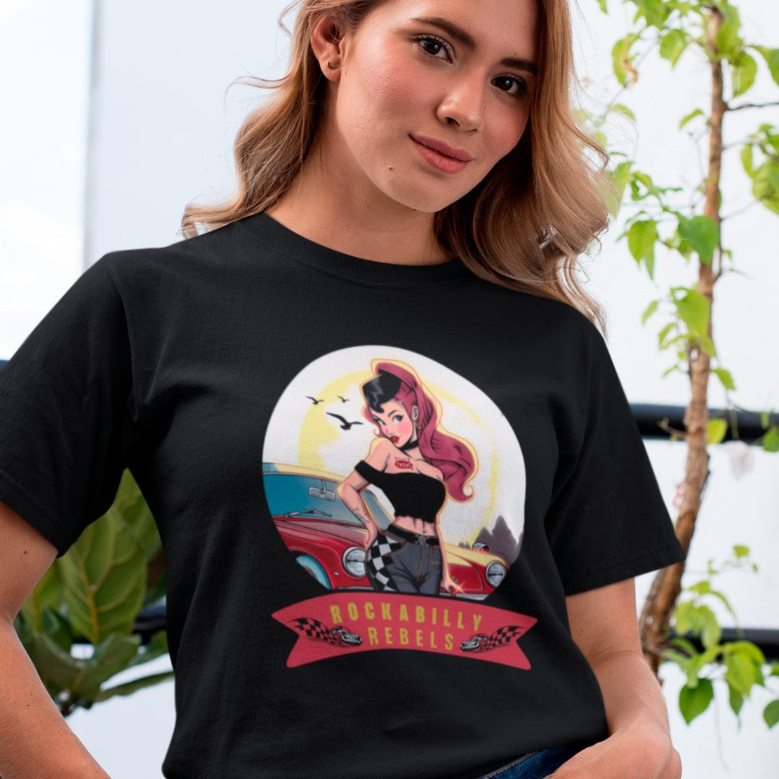 rockabilly-rebels-graphic-white-t-shirt-tee-mockup-of-a-girl-with-a-coy-smile-by-a-balcony