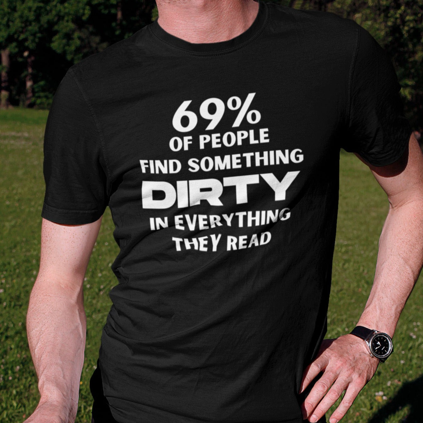 69-percent-of-people-find-something-dirty-in-everything-they-read-black-t-shirt-unisex-funny-mockup-of-a-man-posing-with-his-bicycle