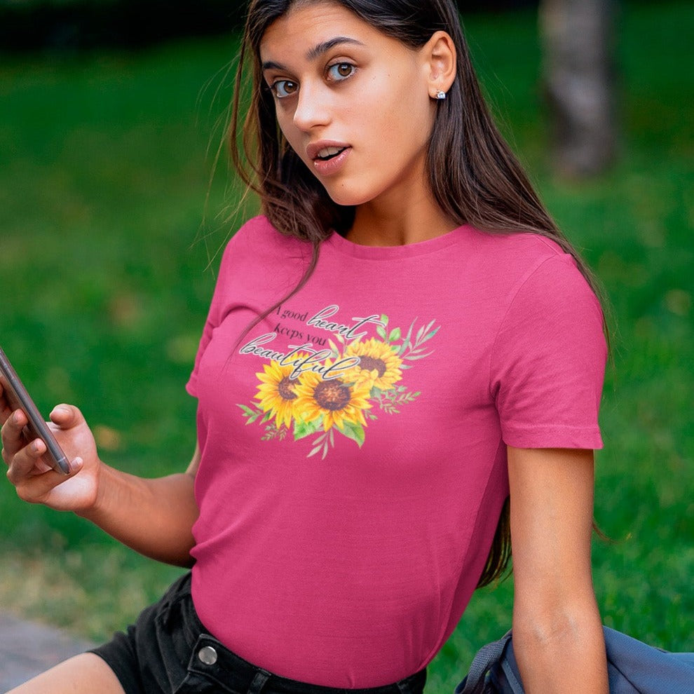 a-good-heart-keeps-you-beautiful-berry-t-shirt-womens-sunflower-mockup-of-a-woman-using-her-mobile-phone