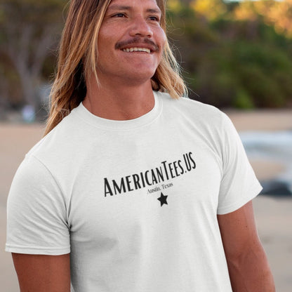 americantees-us-austin-tx-white-t-shirt-unisex-mockup-of-a-cool-man-wearing-a-tee-on-the-beach