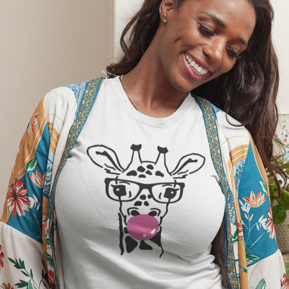bubblegum-giraffe-white-t-shirt-womens-style-mockup-of-a-happy-woman-wearing-a-tee-at-home