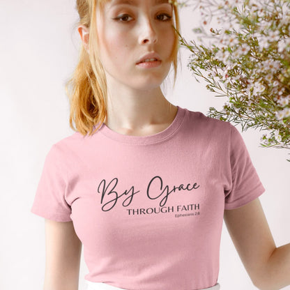 by-grace-through-faith-ephesians-2-8-pink-t-shirt-womens-faith-inspiring-mockup-of-a-woman-wearing-a-tee-and-a-pleated-white-skirt