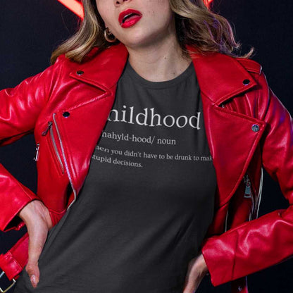 childhood-definition-bella-canvas-t-shirt-mockup-featuring-a-woman-posing-in-front-of-a-neon-hear