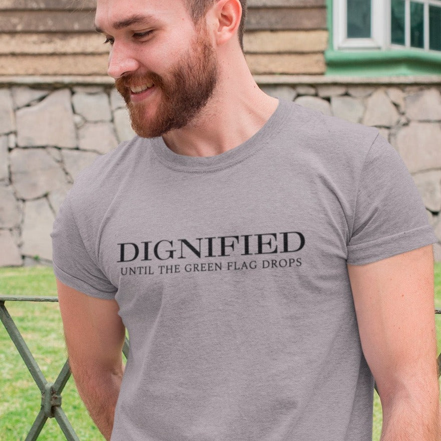 dignified-until-the-green-flag-drops-athletic-heather-mens-t-shirt-sports-racing-mockup-of-a-man-in-front-of-a-house