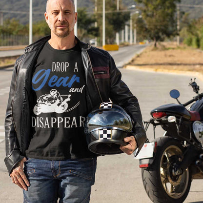 drop-a-gear-and-disappear-t-shirt-mockup-featuring-a-biker-posing-near-his-motorcycle