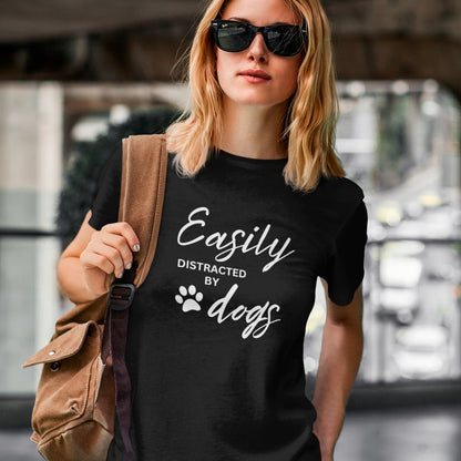 easily-distracted-by-dogs-black-t-shirt-womens-animal-lover-mockup-featuring-a-cool-woman-in-an-urban-setting