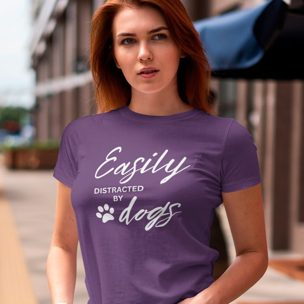 easily-distracted-by-dogs-team-purple-t-shirt-womens-animal-lover-mockup-featuring-a-serious-long-haired-woman
