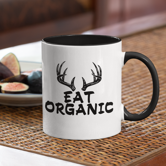eat-organic-glossy-mug-11-oz-with-deer-horns-front-side-huntingof-an-11-oz-coffee-mug-next-to-a-fruit-plate
