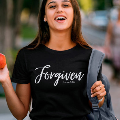 forgiven-luke-5-20-black-t-shirt-unisex-inspiring-christian-tee-mockup-of-a-young-female-student-laughing