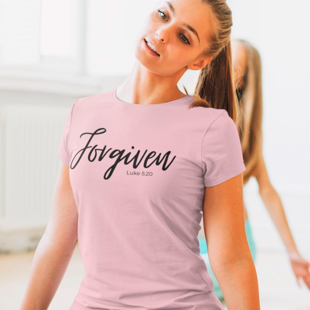 forgiven-luke-5-20-pink-t-shirt-unisex-inspiring-christian-mockup-of-a-yoga-teacher-wearing-a-crew-neck-tee