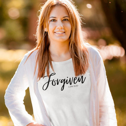 forgiven-luke-5-20-white-t-shirt-unisex-inspiring-christian-mockup-of-a-woman-with-a-basic-tee-posing-in-a-park