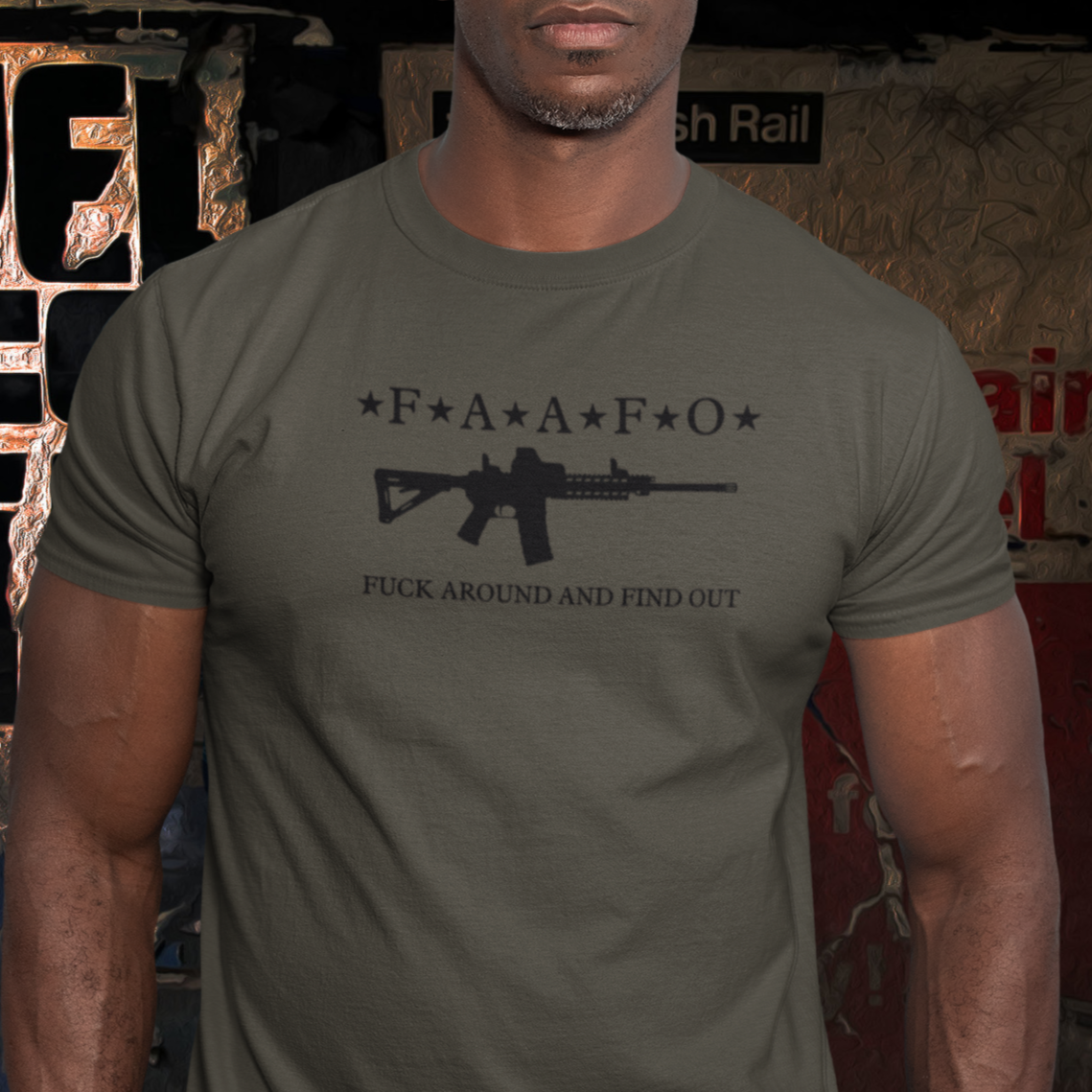 fuck-around-and-find-out-army-green-t-shirt-mens-mockup-of-a-muscular-man-wearing-sunglasses-and-a-tee