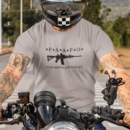 fuck-around-and-find-out-athletic-heather-grey-t-shirt-mens-mockup-of-a-tattooed-man-riding-his-motorcycle