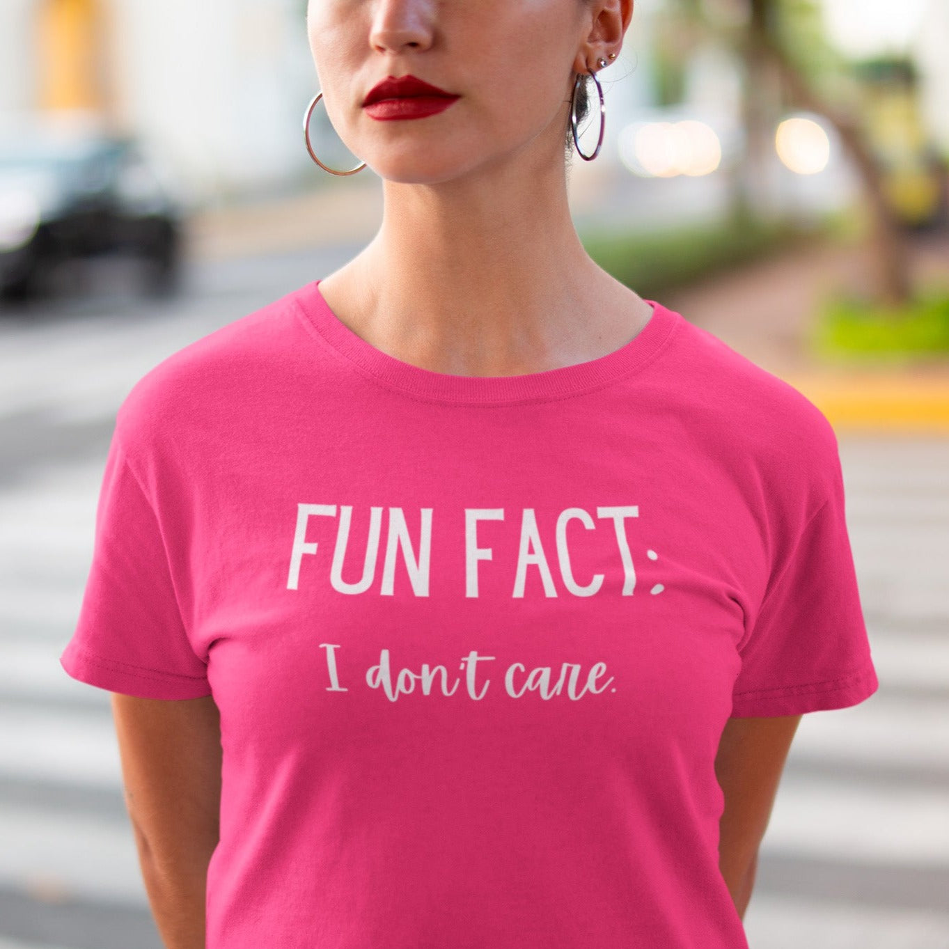 fun-fact-i-dont-care-funny-berry-t-shirt-womens-sarcastic-mockup-of-a-woman-on-the-street
