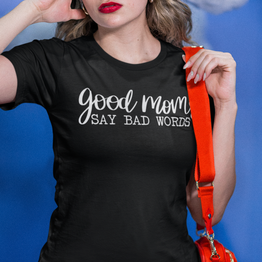 good-moms-say-bad-words-black-t-shirt-womens-tee-mockup-of-a-fed-up-woman-in-a-studio-with-clouds