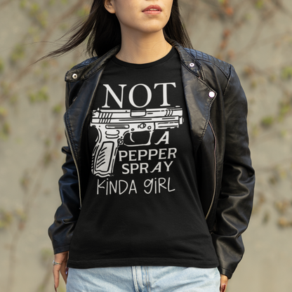 gun-girl-not-a-pepper-spray-kind-of-girl-black-t-shirt-mockup-featuring-a-young-woman-with-a-cool-vibe
