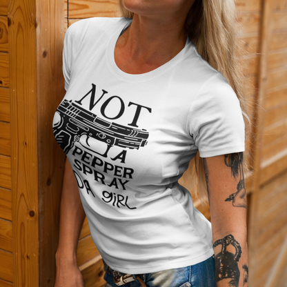 gun-girl-not-a-pepper-spray-kind-of-girl-white-t-shirtt-shirt-mockup-of-a-tattooed-woman-leaning-on-a-wooden-surface