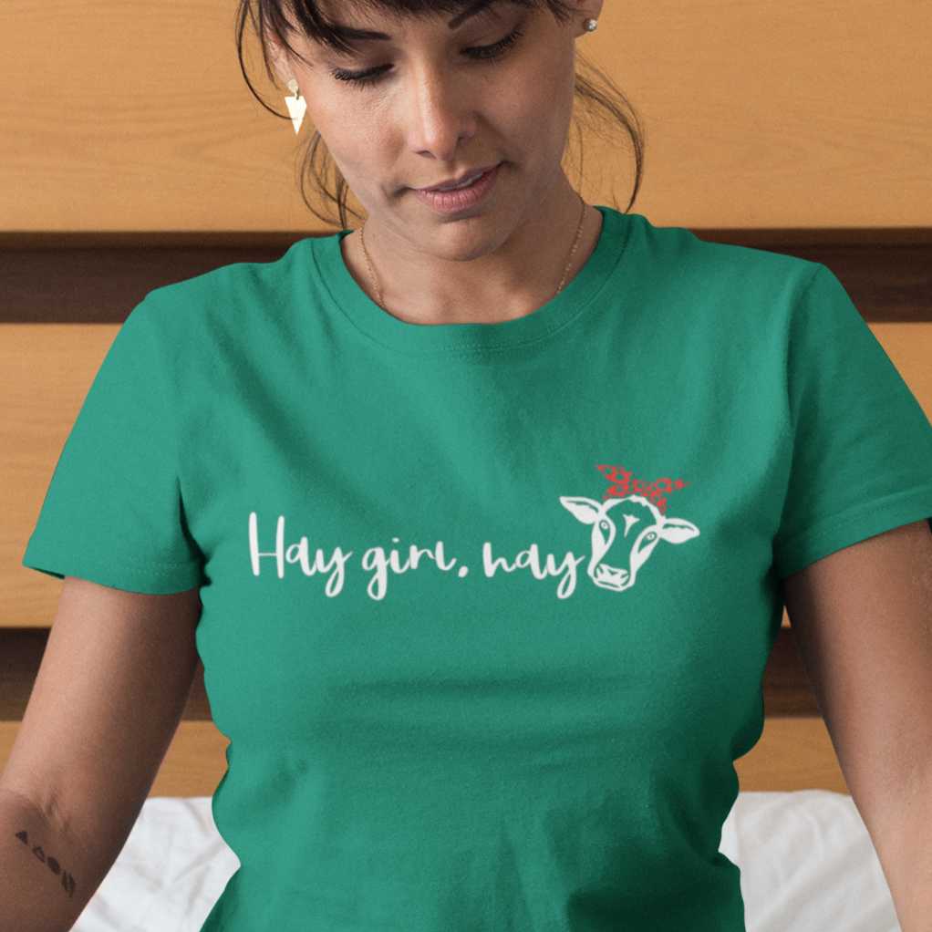 hay-girl-hay-heather-kelly-t-shirt-cowgirl-woman-wearing-mockup-petting-her-cat-on-bed