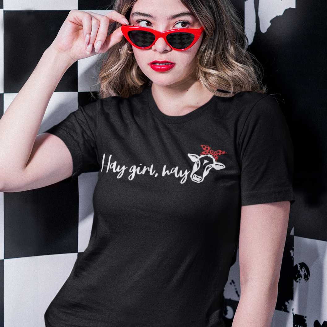 hay-girl-hay-round-neck-t-shirt-mockup-of-a-woman-with-sunglasses-posing-by-a-checkered-background