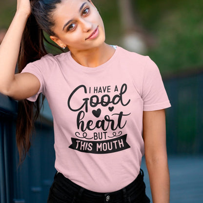 i-have-a-good-heart-but-this-mouth-pink-t-shirt-women-sarcastic-funny-mockup-featuring-a-young-woman-grabbing-her-hair