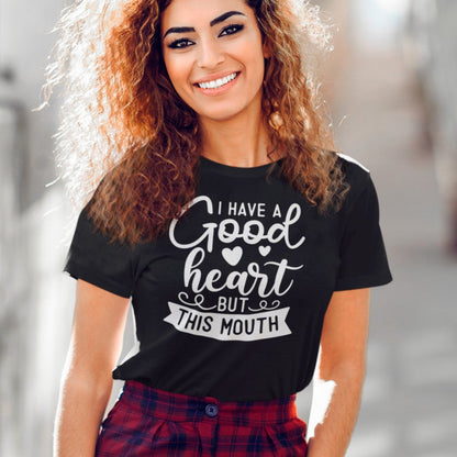 i-have-a-good-heart-but-this-mouth-pink-t-shirt-women-sarcastic-funny-mockup-of-a-smiling-young-woman-wearing-a-tee-on-the-street